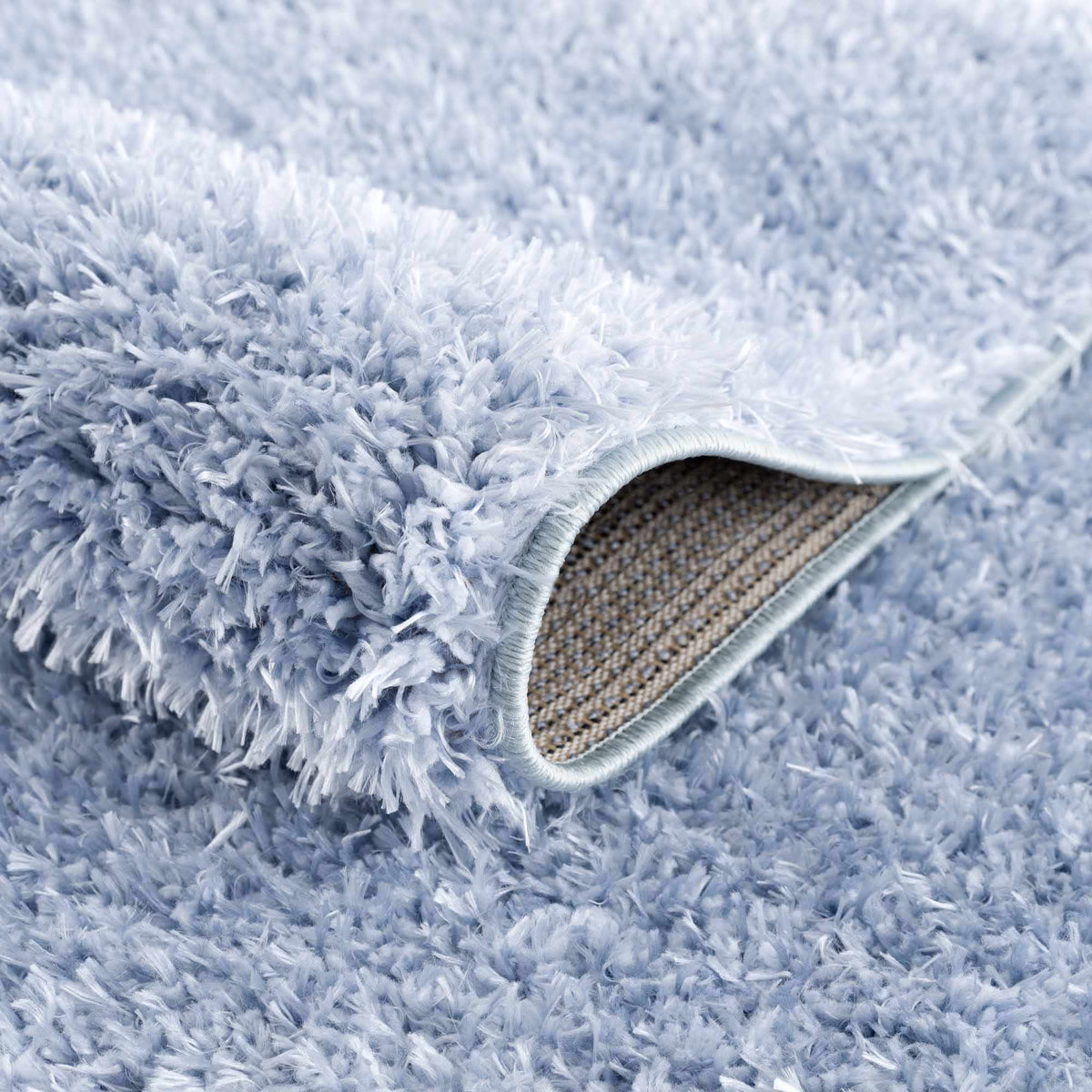 Faina Solid Aqua Shag Washable Area Rug