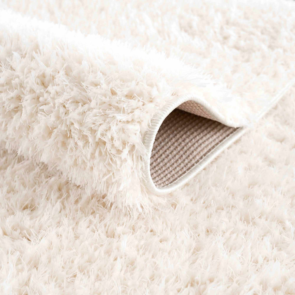 Faina Solid Cream Shag Washable Area Rug