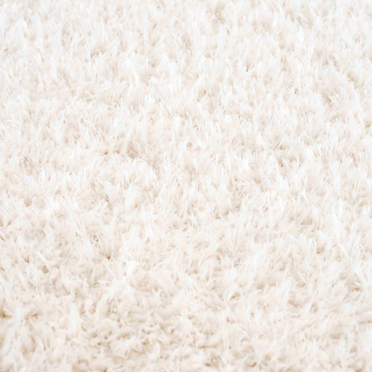 Faina Solid Cream Shag Washable Area Rug