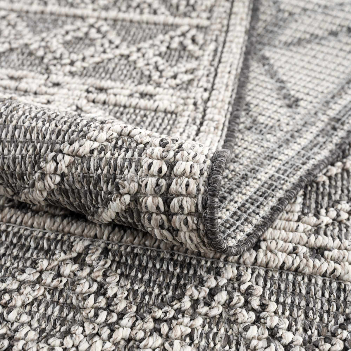 Diah Black & Bone Outdoor Area Rug - Clearance