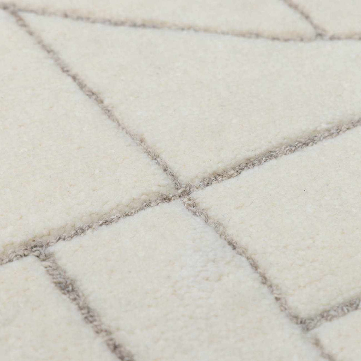 Fusao Off White Area Rug - Clearance