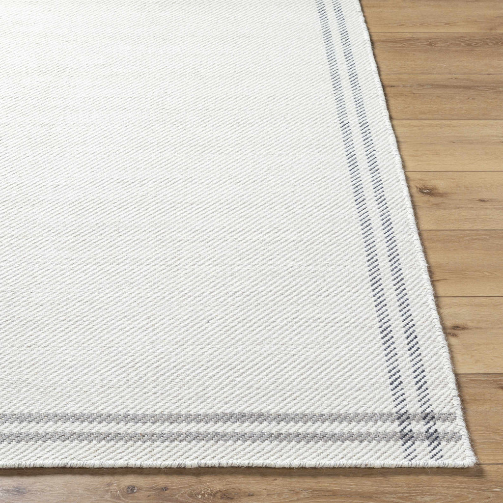 Nimue Cream & Charcoal Bordered Area Rug - Clearance