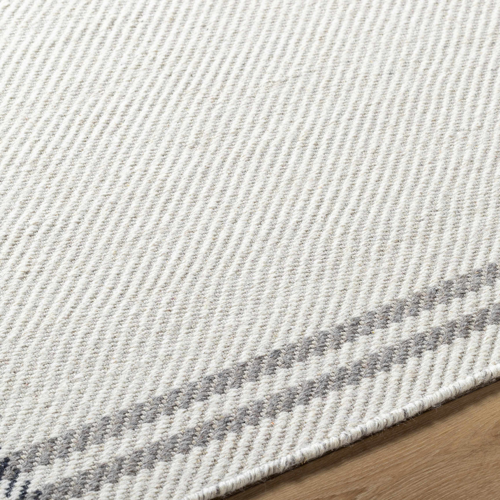 Nimue Cream & Charcoal Bordered Area Rug - Clearance