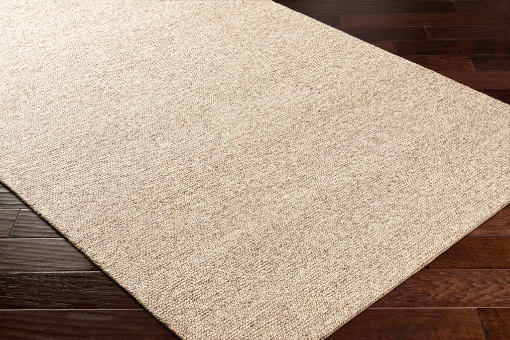 Alyra Tan Solid Area Rug - Clearance