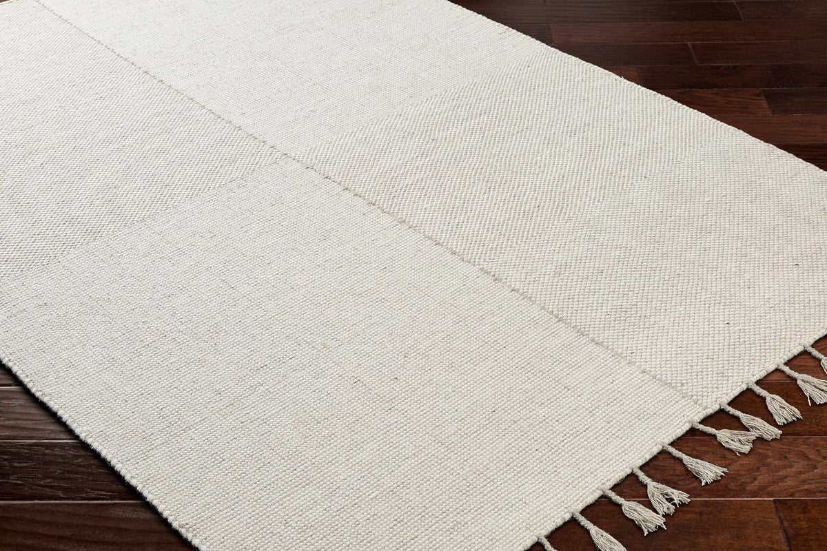 Abhay Cream Wool Area Rug - Clearance