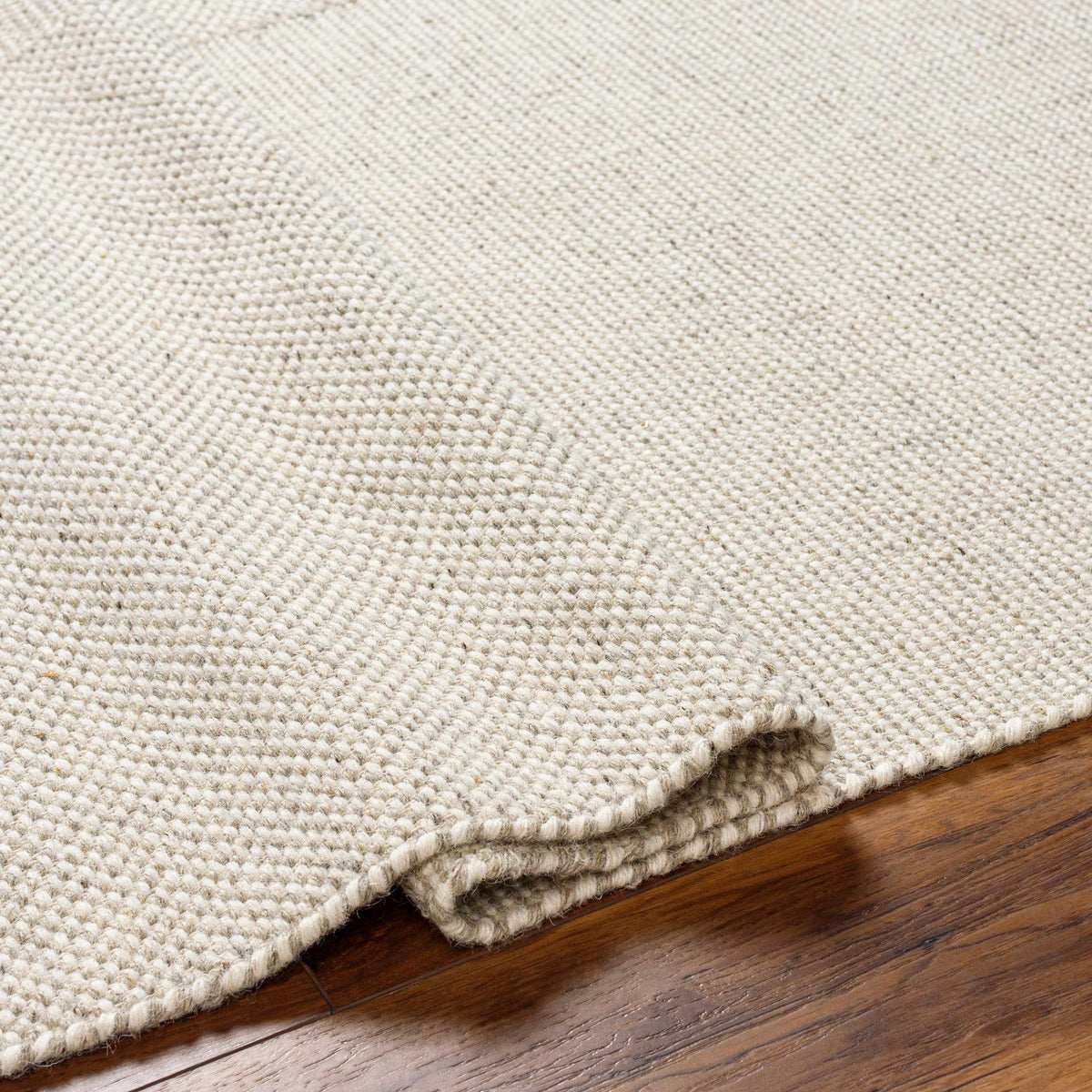 Abhay Cream Wool Area Rug - Clearance